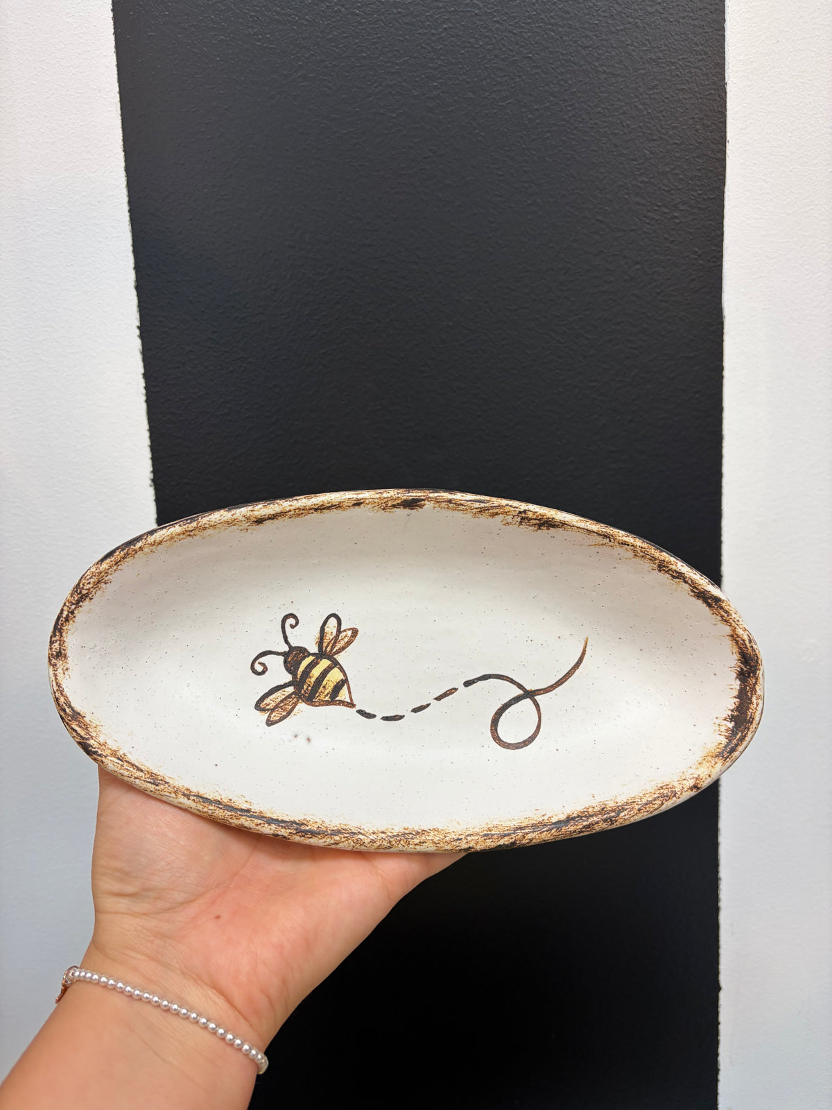 Bee Buzzing Around Pottery